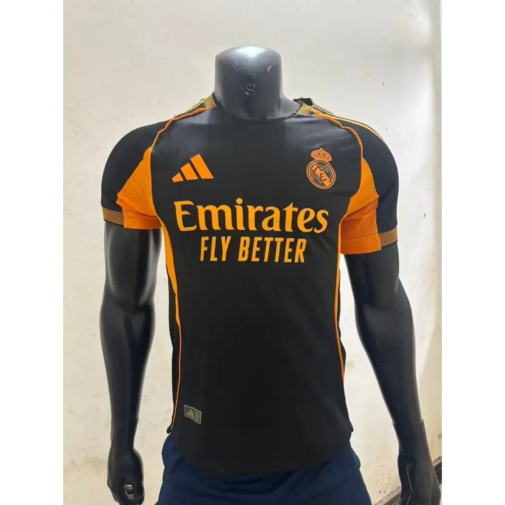 Maillot Real Madrid Noir & Orange 2025/2026